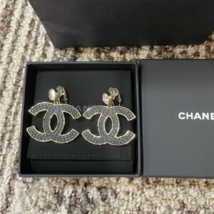 Chanel leather pattern black gold double c ear clip