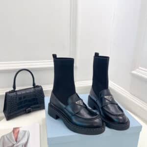 prada catwalk style thick-soled triangle logo socks ankle boots