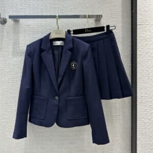 Dior college style blue suit jacket with pleated skirt