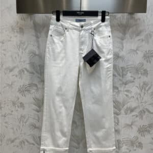 prada white trousers turned up jeans