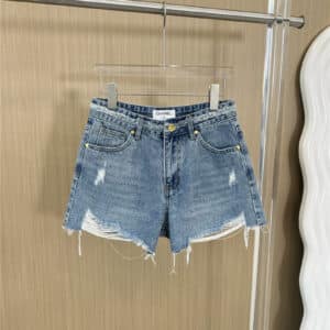 Chanel embroidered letter pocket ripped denim shorts