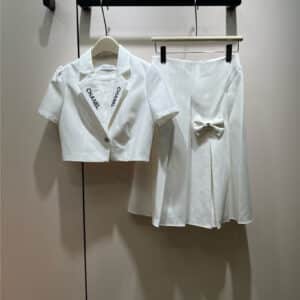 Chanel short small suit jacket + split pleated skirt