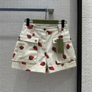 gucci cream strawberry print roll-up shorts