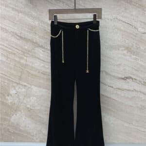 Celine Arc de Triomphe chain velvet bootcut trousers