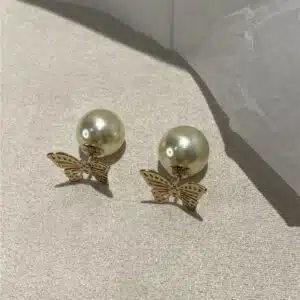 dior hollow butterfly pearl earrings