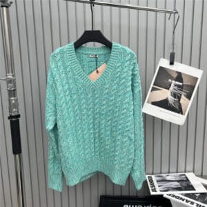 miumiu holiday series green sweater