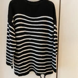 dior black and white contrasting off-shoulder lazy sweater