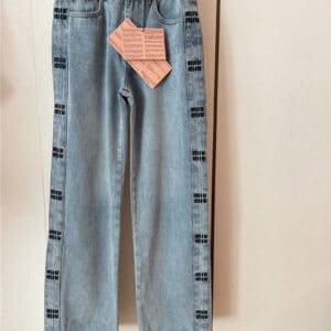 miumiu denim trousers with side letter embroidery