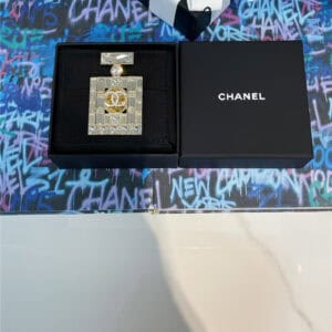 chanel diamond perfume bottle brooch